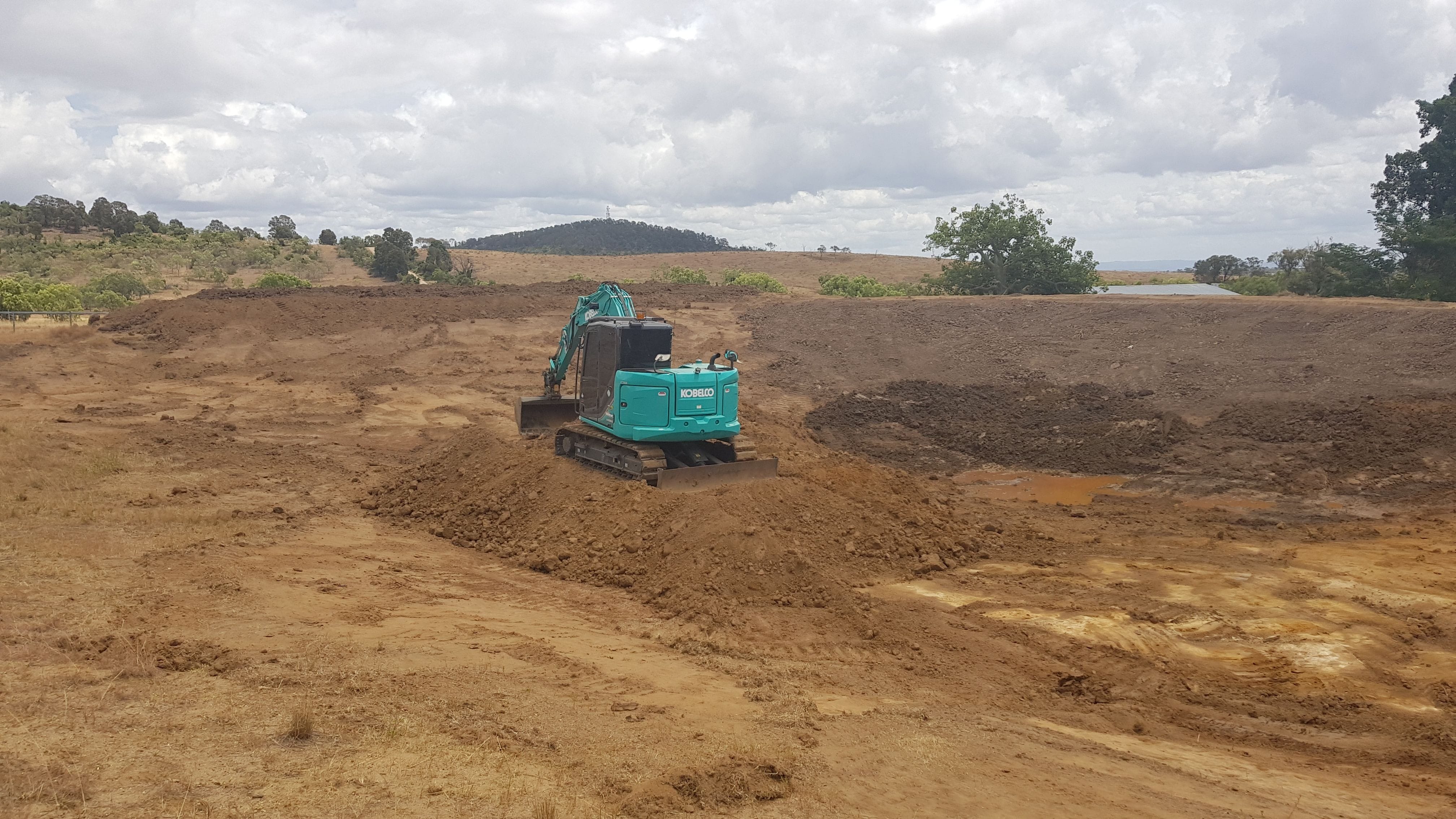Repaired a broken dam wall. Desilted, cleaned & excavated the dam deeper.